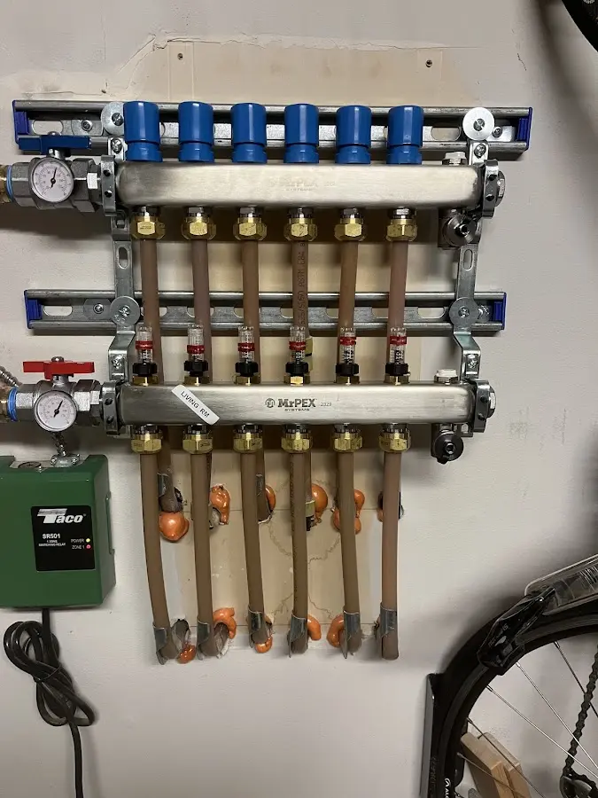 Plumber performing Water Heater Repair at a residential property in Sloatsburg